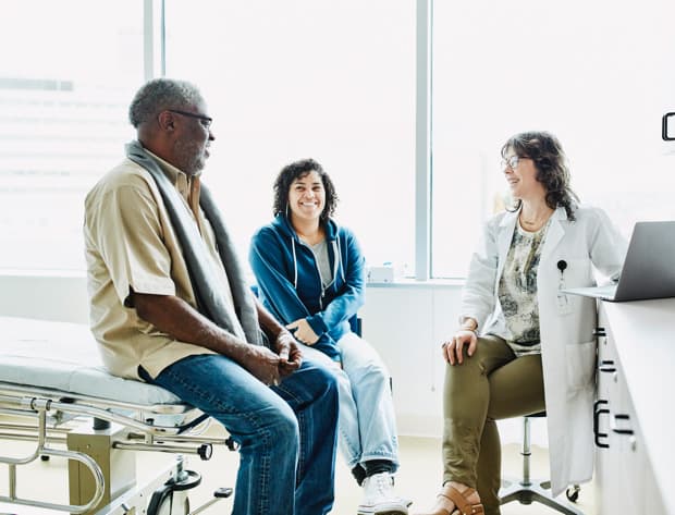 Patient talking to his doctor.