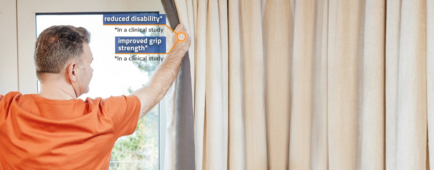 Men opening window curtains. Men opening window curtains. GAMMAGARD LIQUID reduces disability and improves grip strength.