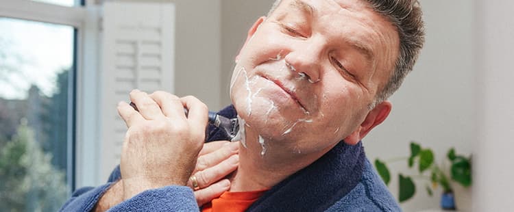 Man shaving.